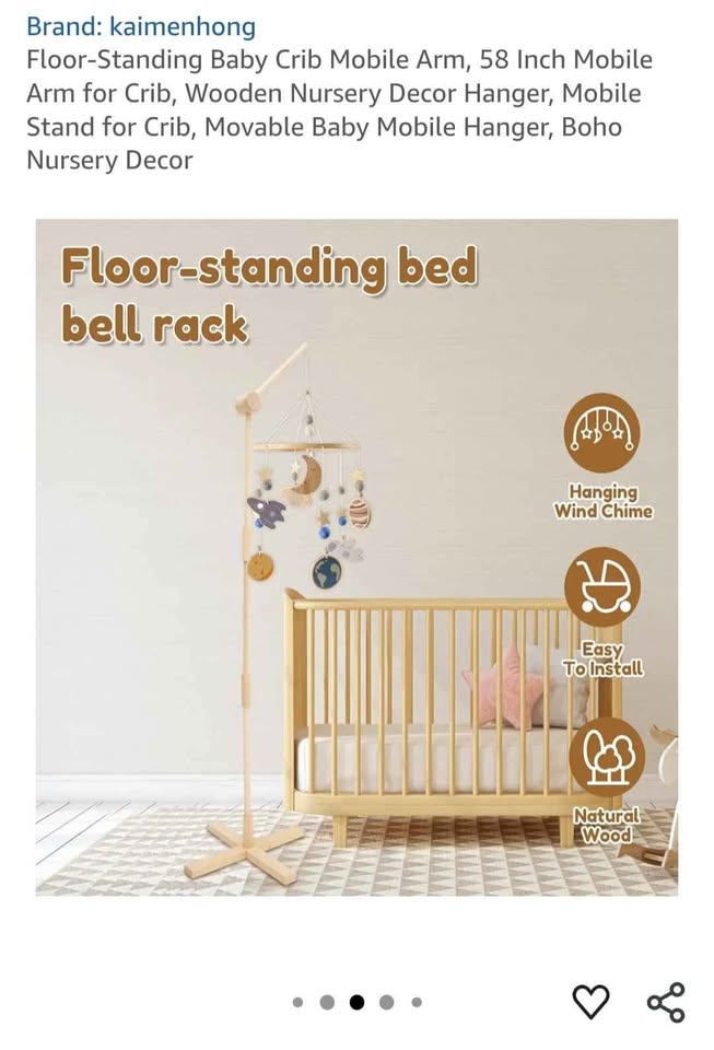 Floor standing baby crib arm